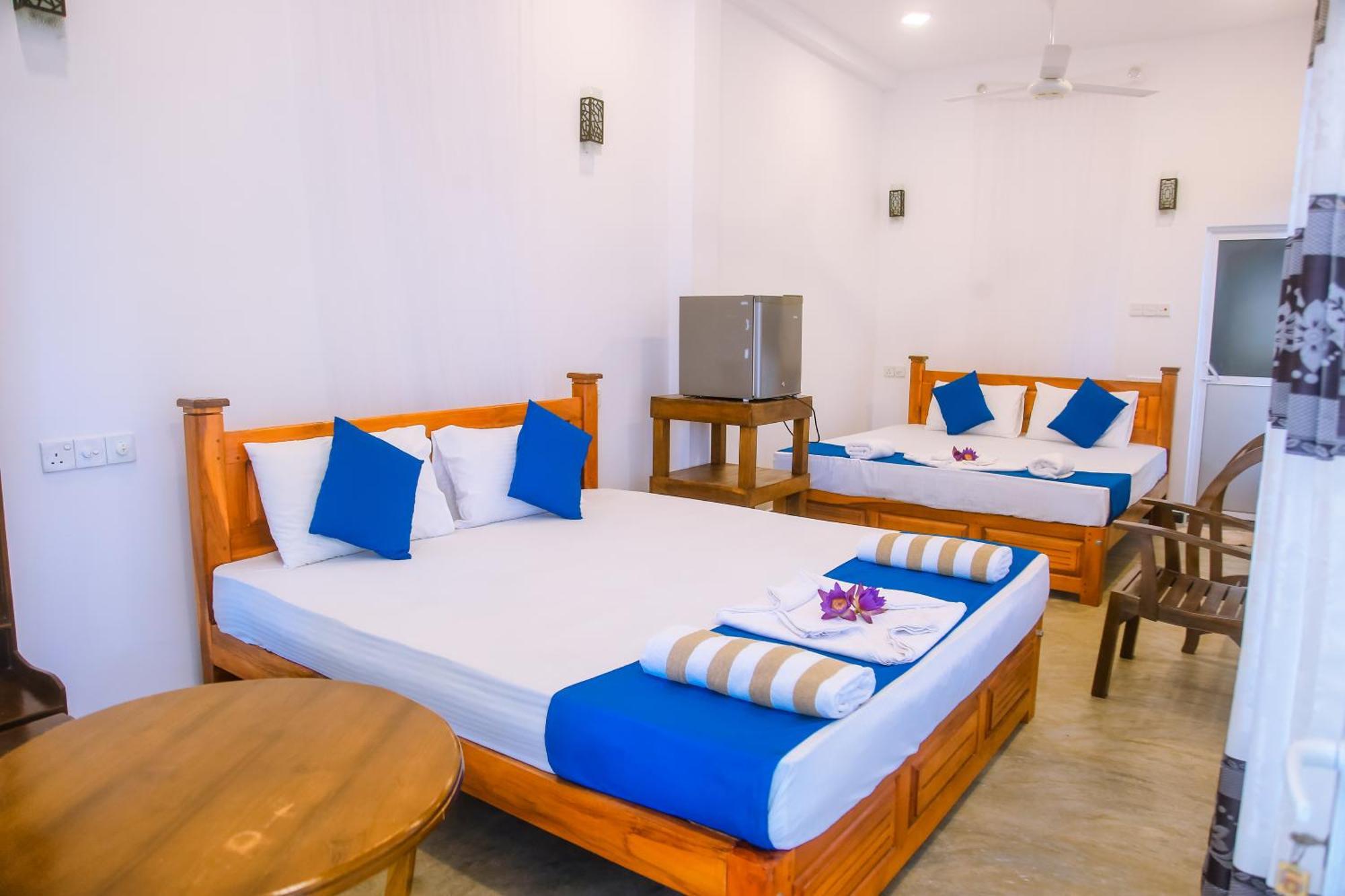 Blue Sky Hotel Мириса Екстериор снимка