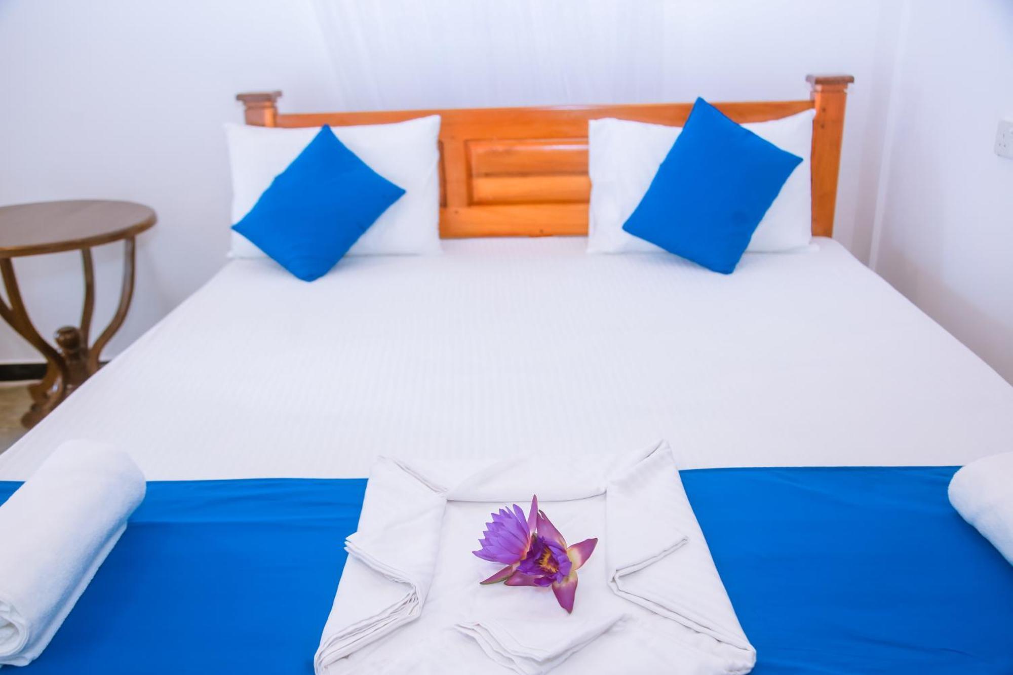 Blue Sky Hotel Мириса Екстериор снимка